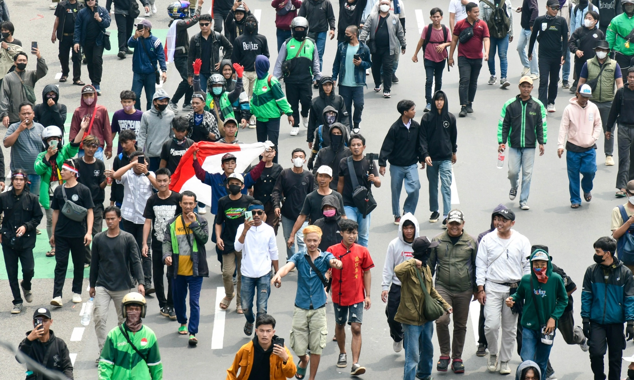 Dozens of demonstrators from the Civil Society Coalition